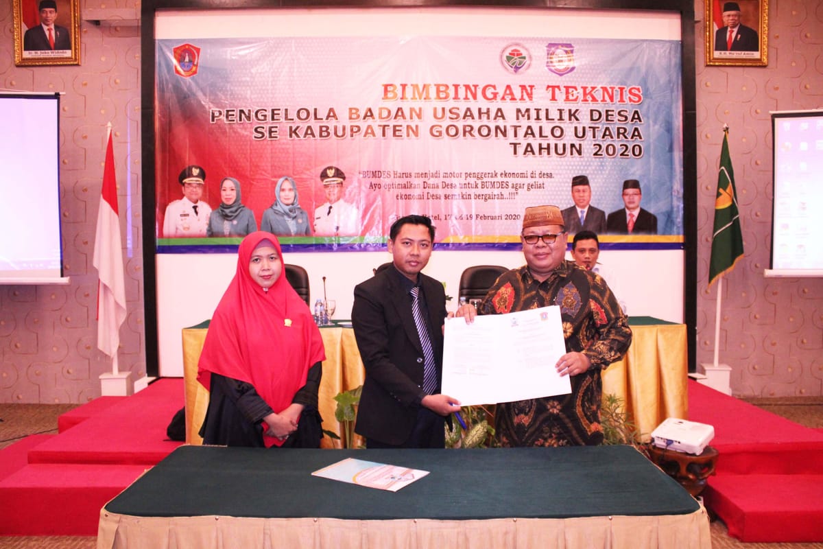 UBM Gorontalo - Kadis PMD Tandatangani PKS Dihadapan Aparat Desa